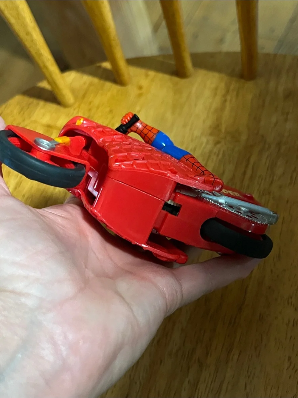 This is a Vintage 1995 Toy Biz Spider-Man Motorized Wheelie Cycle
